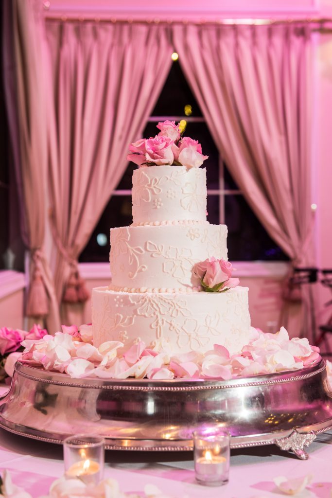 Wedding cake with pink decor