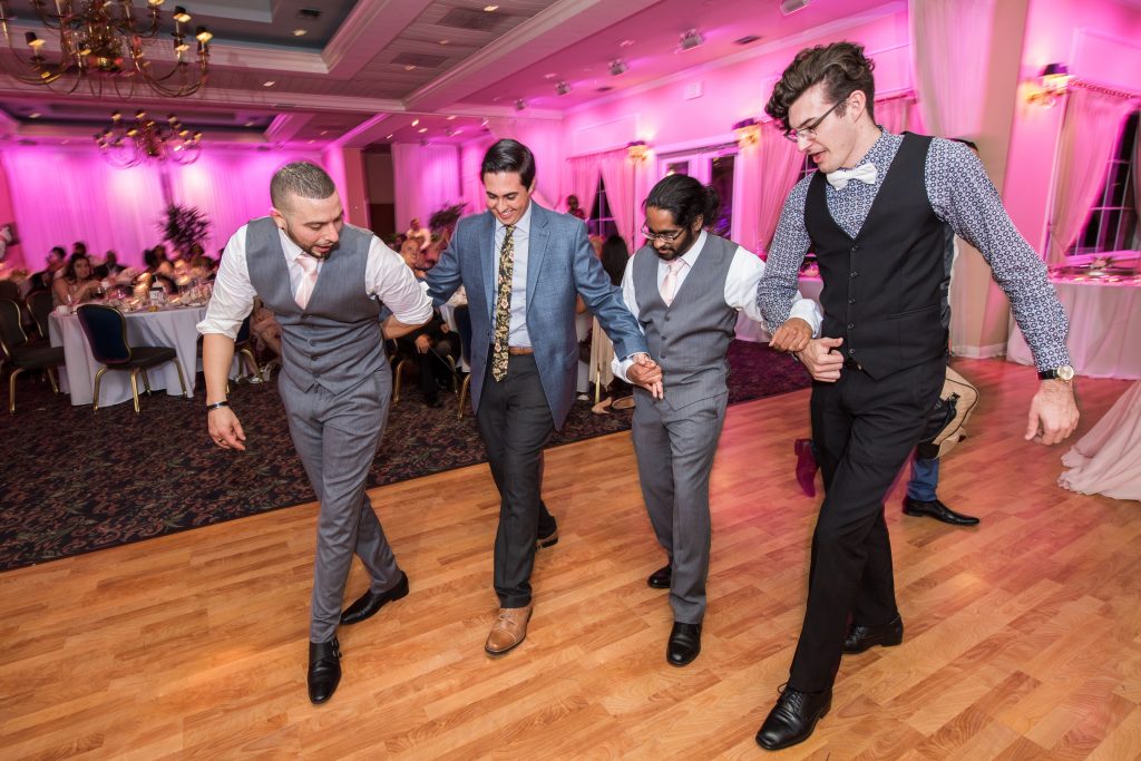 Groomsmen dancing