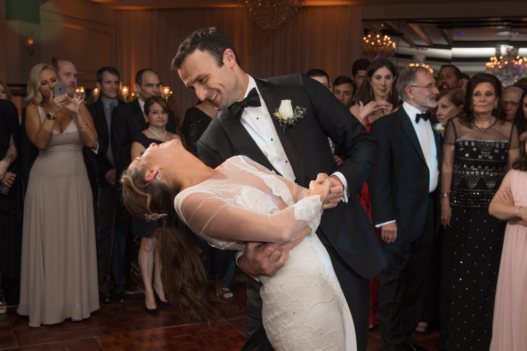 Bride and groom first dance dip