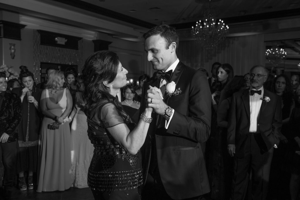 Groom and mom dance