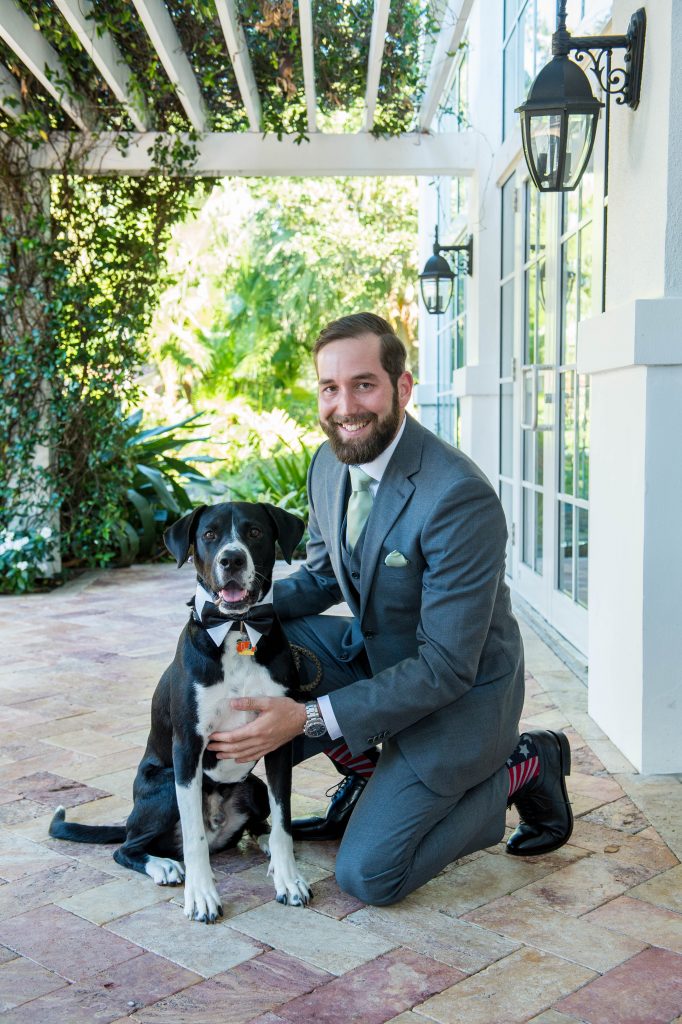 groom with his pup