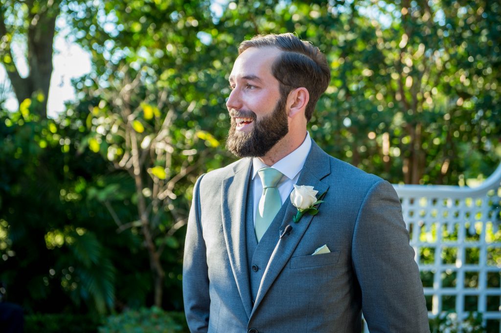 groom seeing his bride for the first time at wedding ceremony