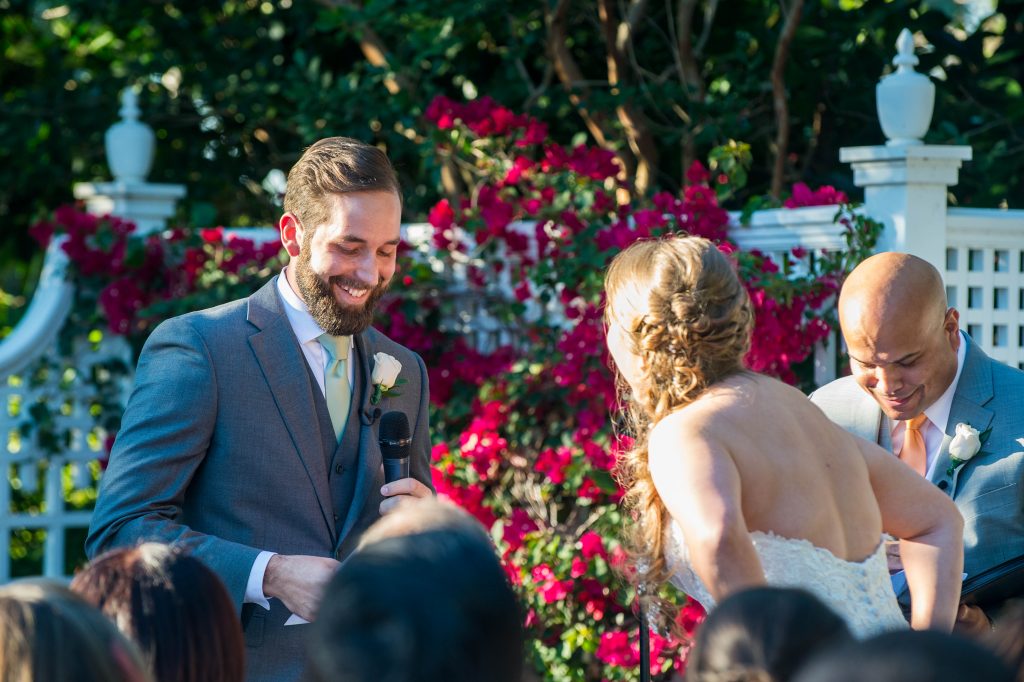 bride laughing durning wedding vows