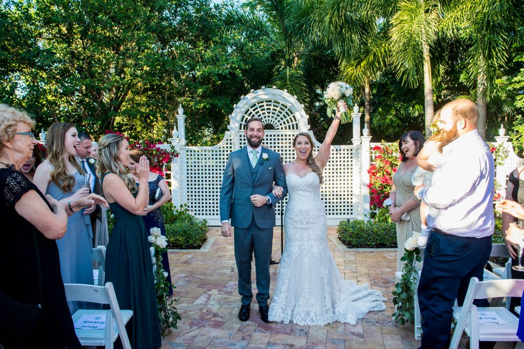 bride and groom walking down the aisle