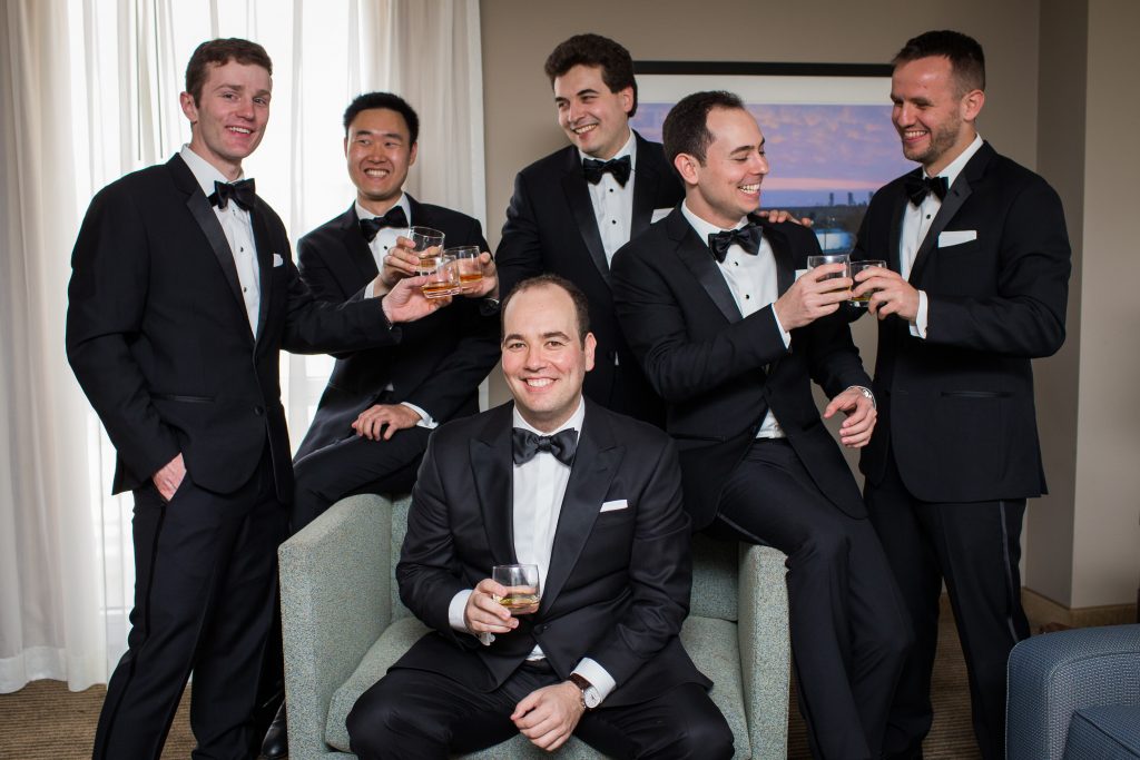 groom getting ready with groomsmen