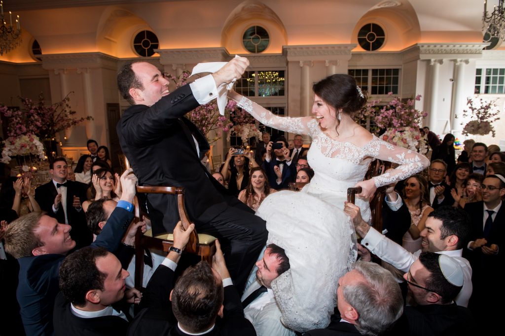 bride and groom wedding chair lift