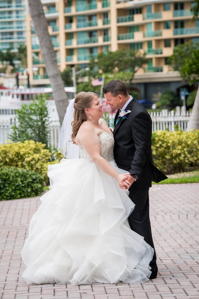 bride and groom laughing