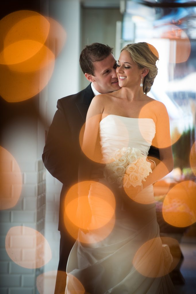 Bride and groom portrait with lights