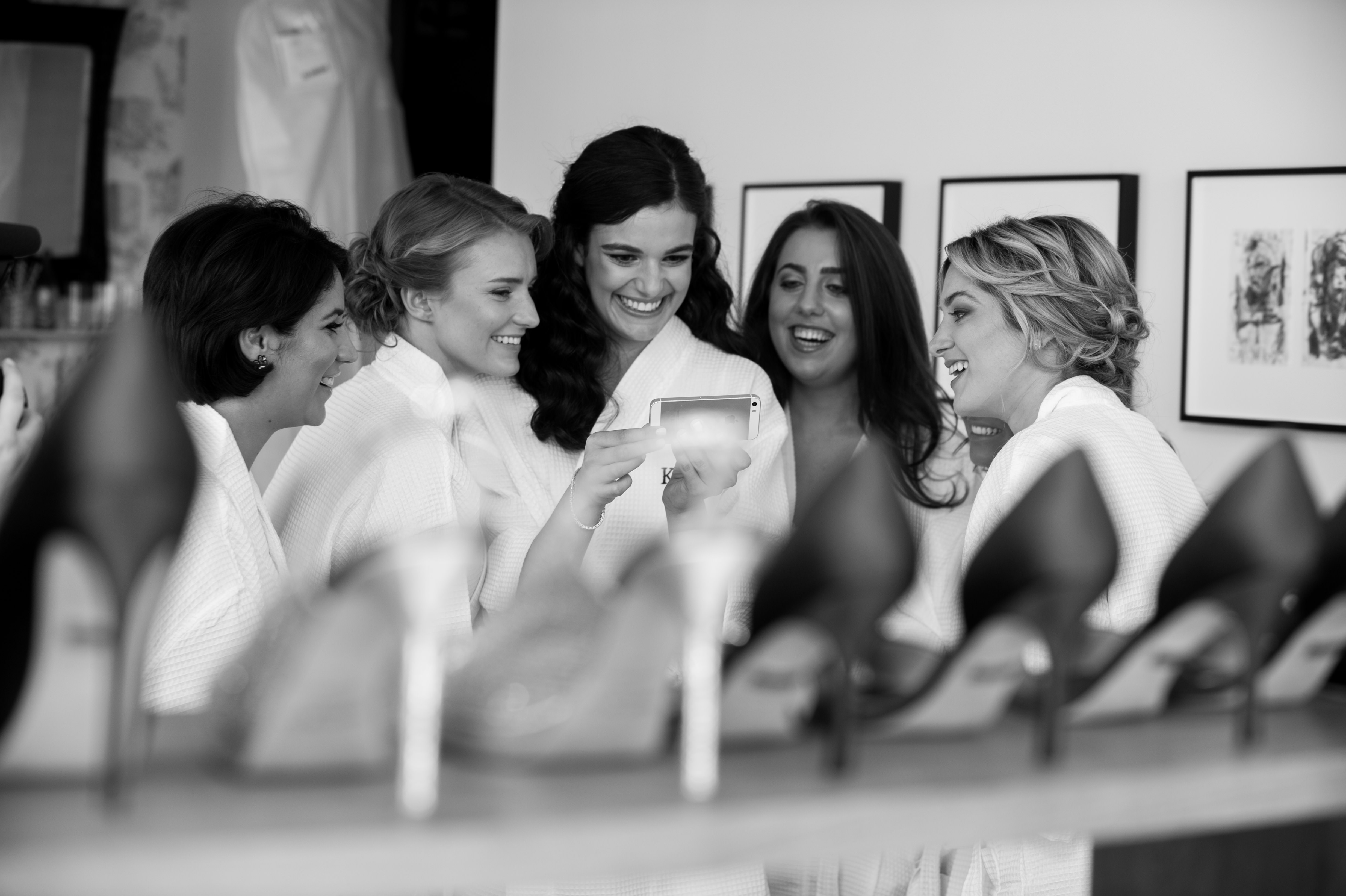 Bride and bridesmaids with shoes in front