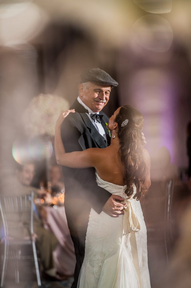 Brides first dance with father looking at her