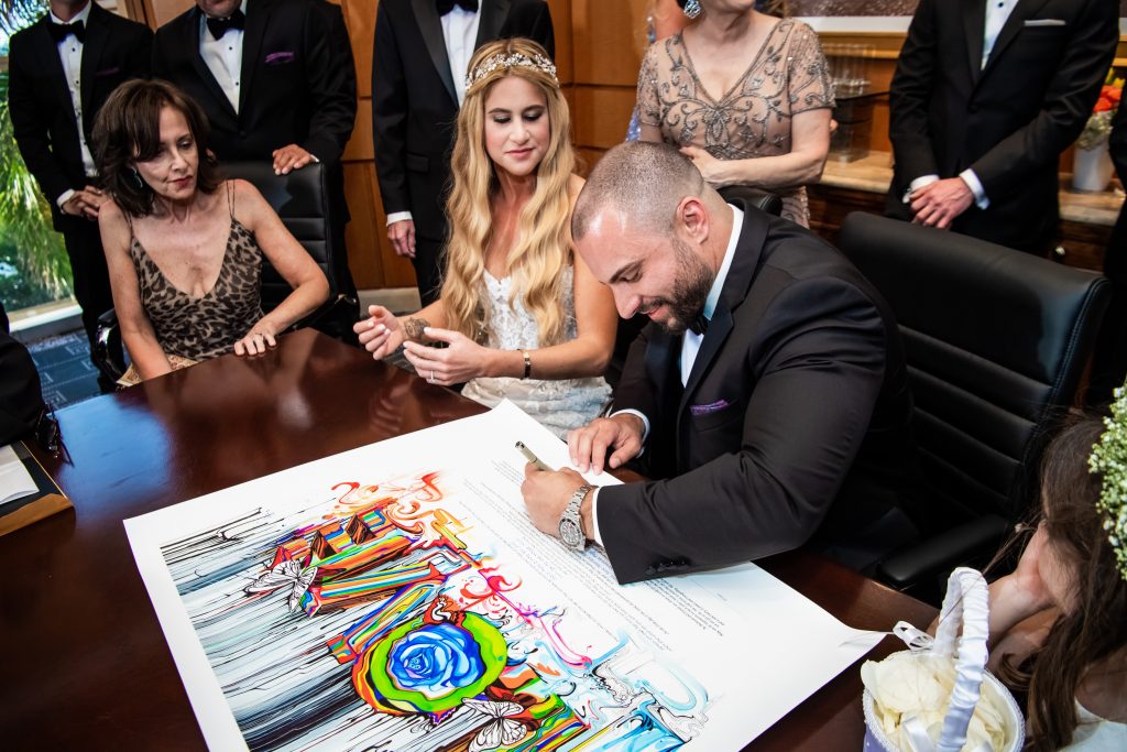 groom signing jewish catuaba